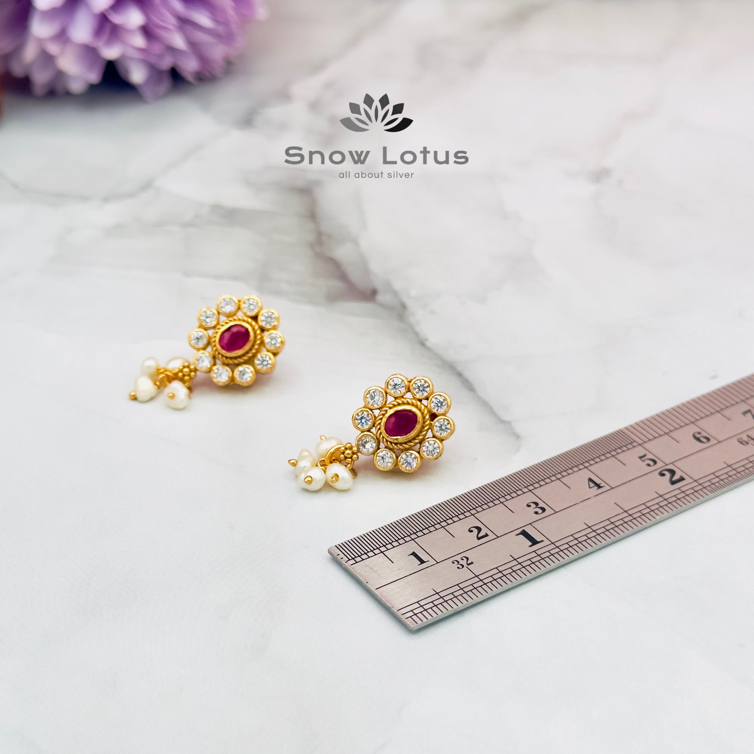 Chic oval ruby studs