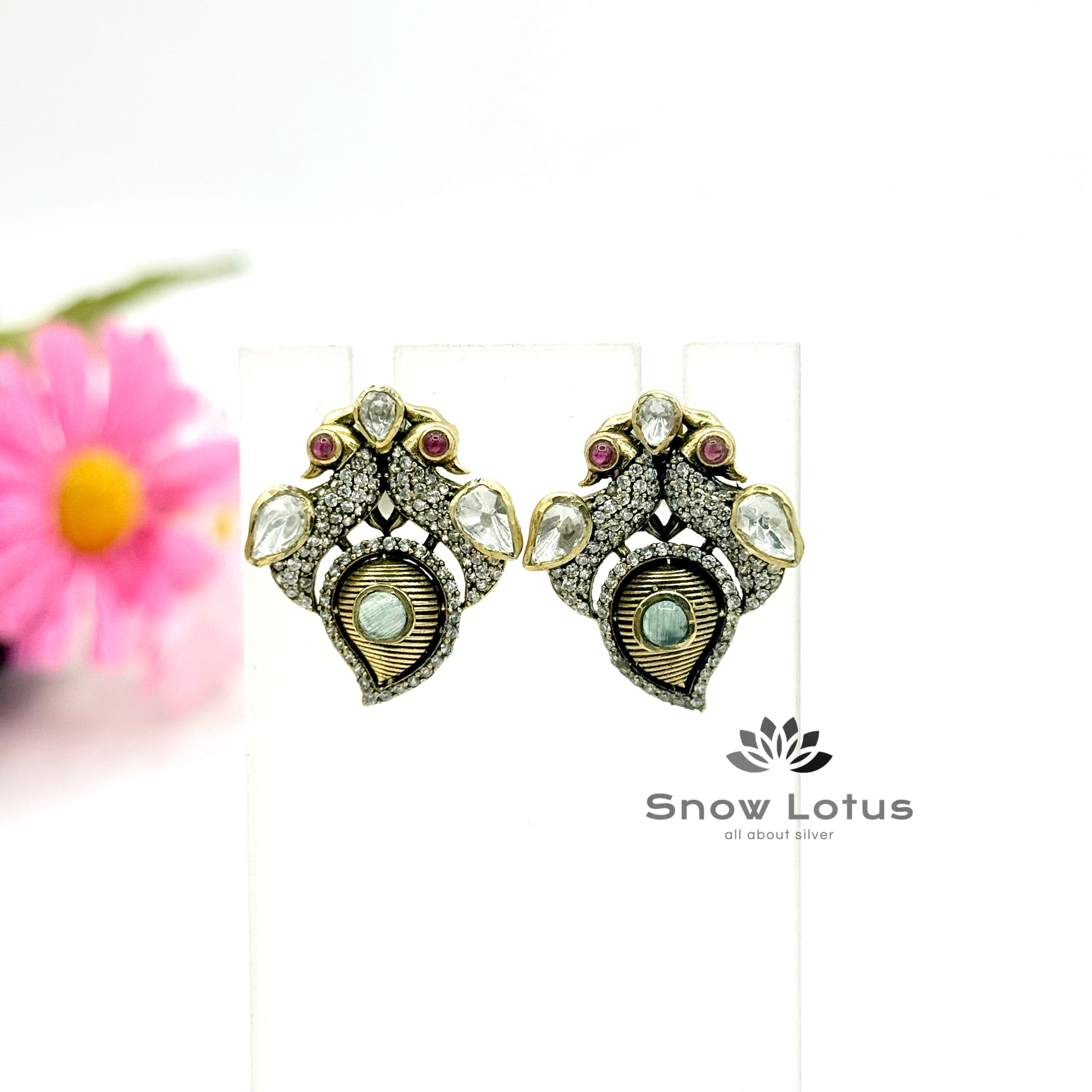 Shanq Peacock Moissanite studs