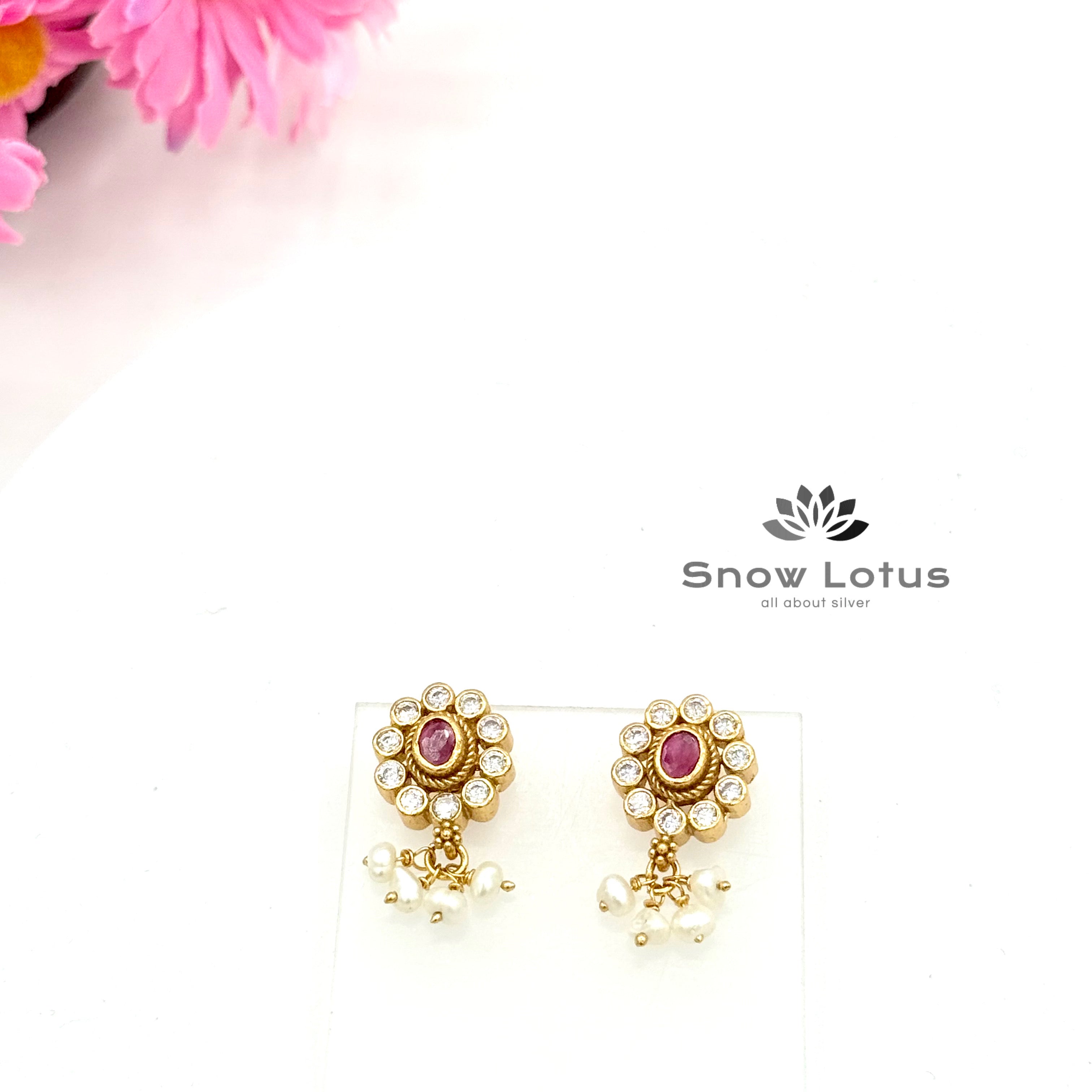 Chic oval ruby studs