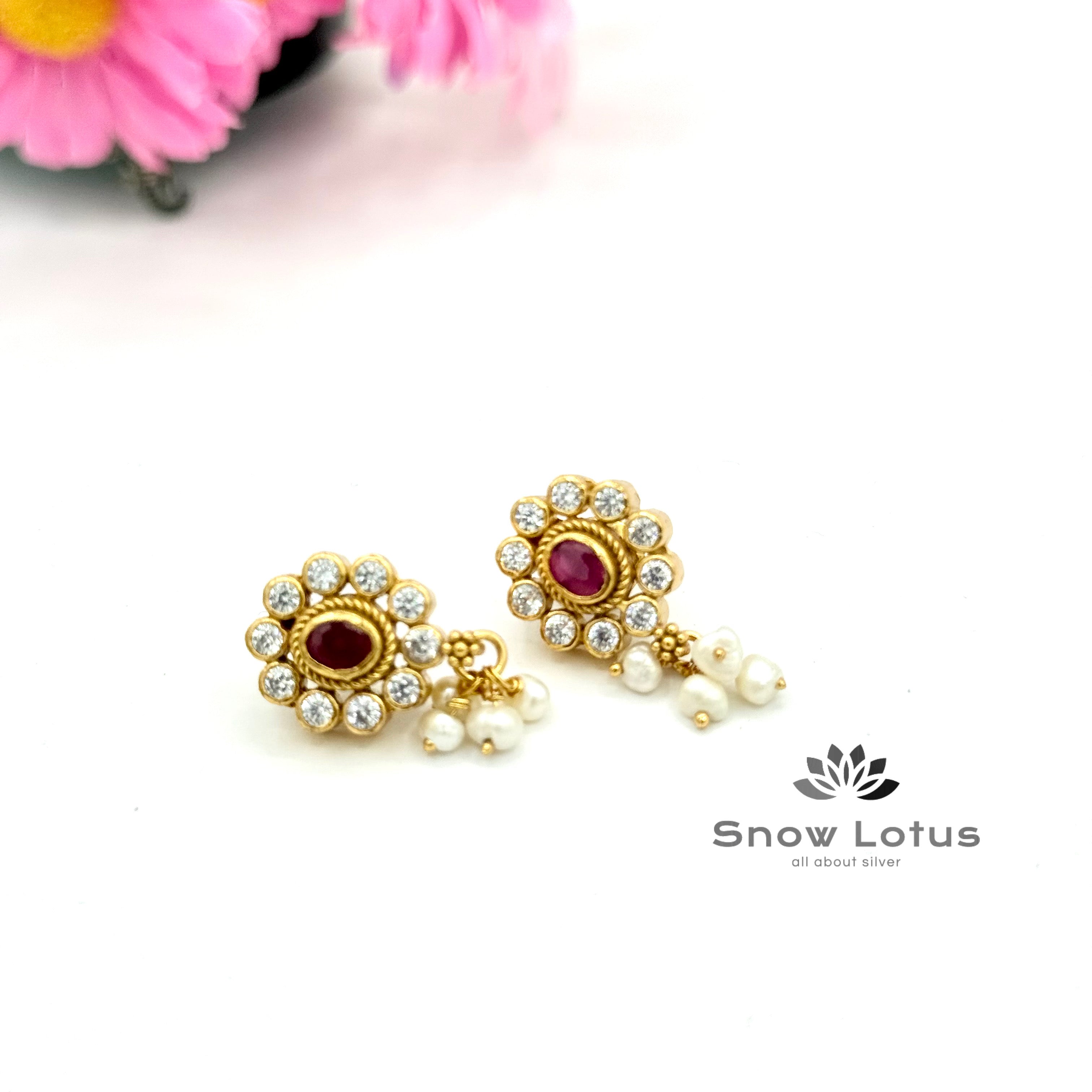 Chic oval ruby studs