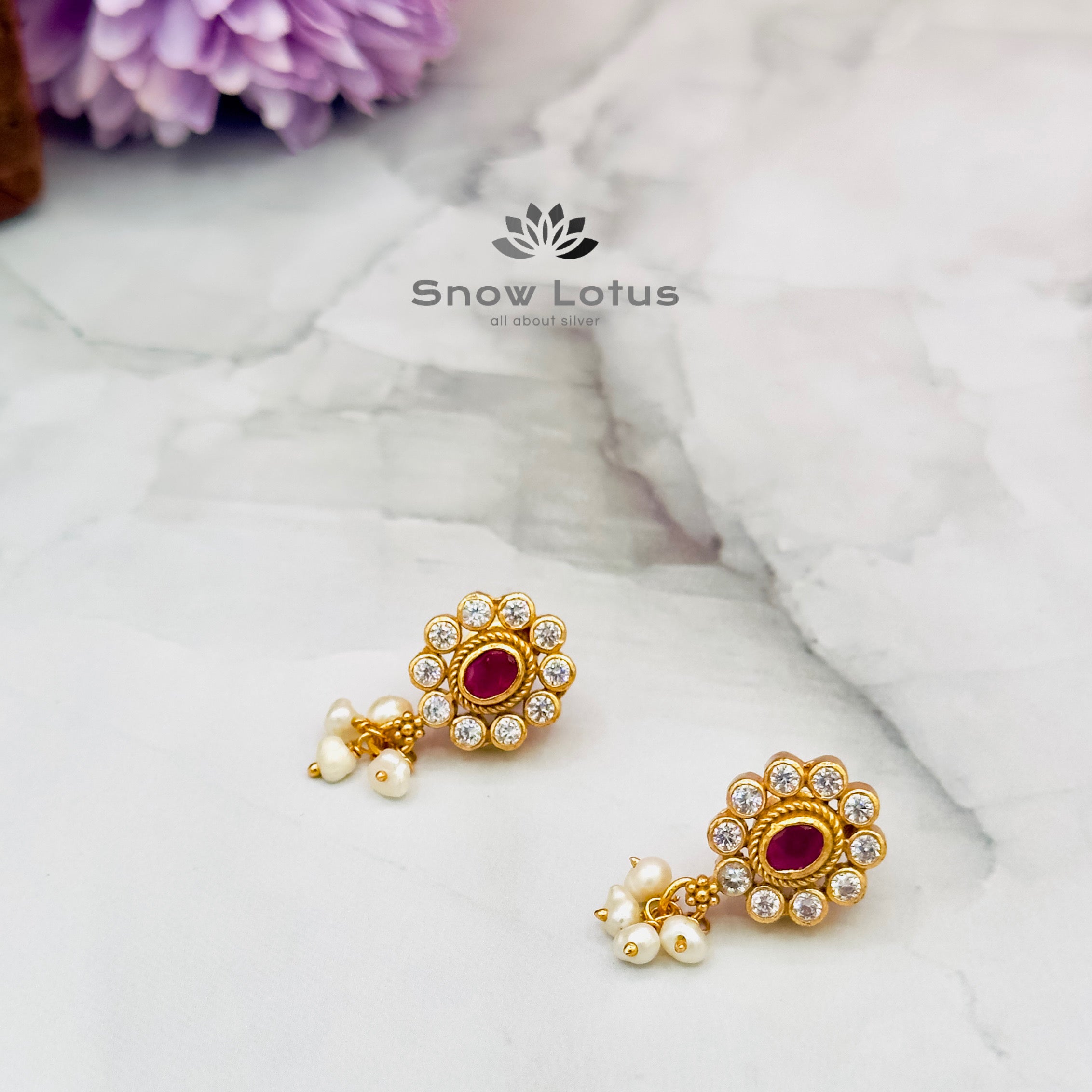 Chic oval ruby studs