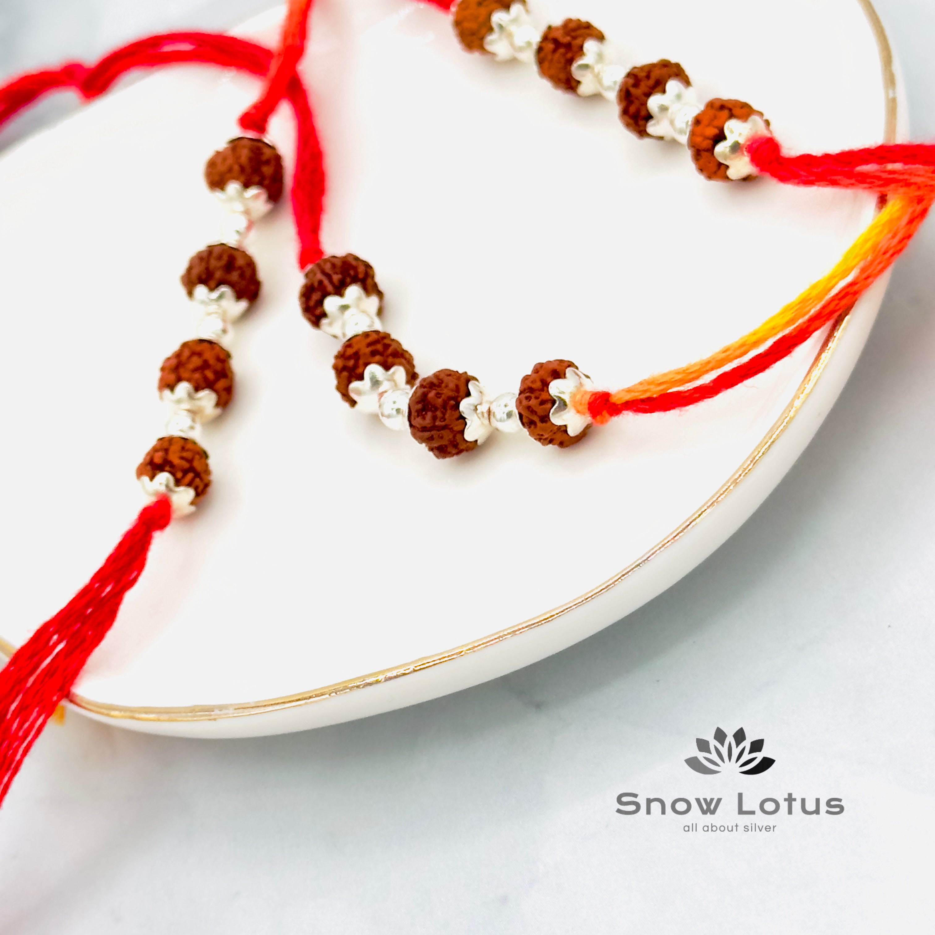 Rakhis with Rudraksha