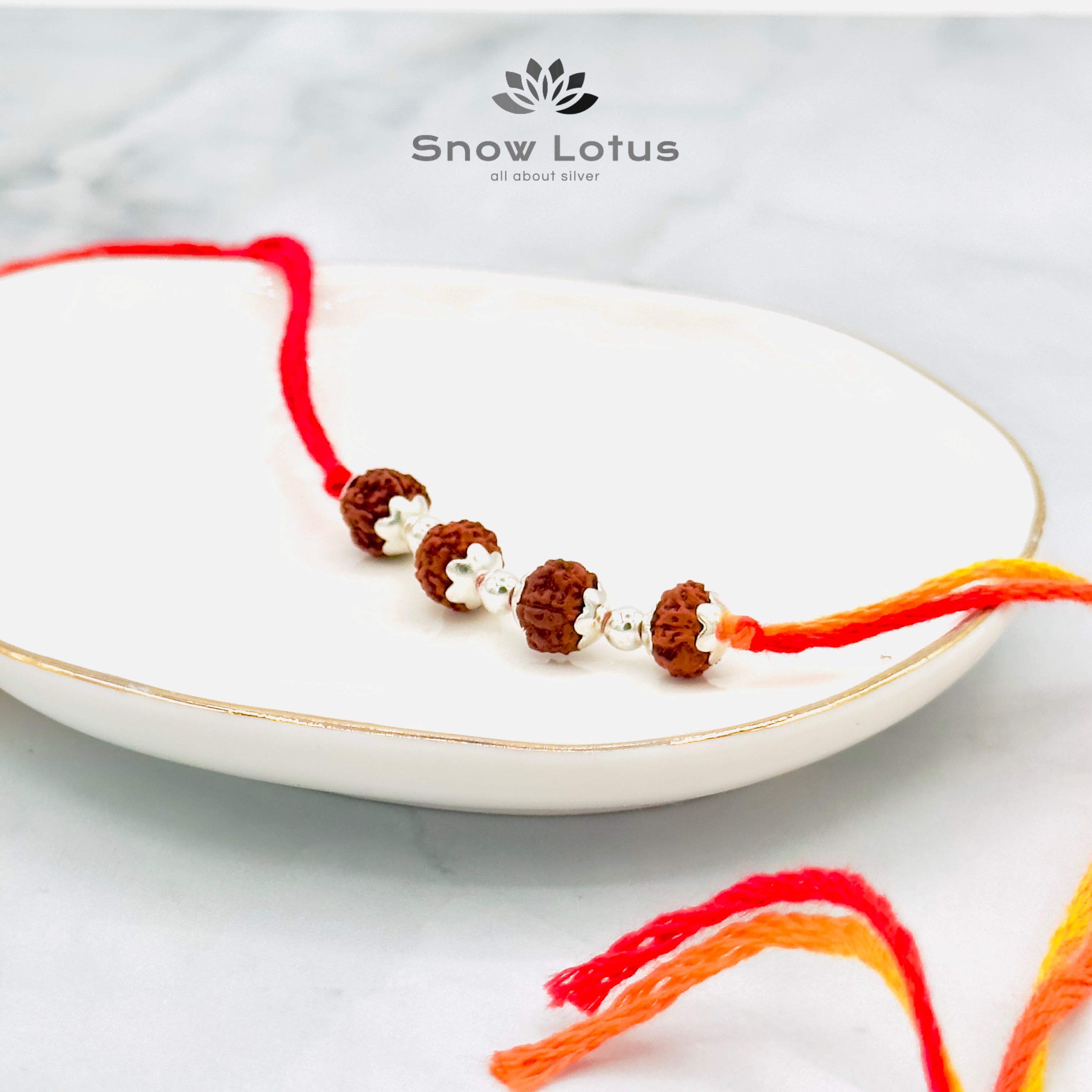 Rakhis with Rudraksha