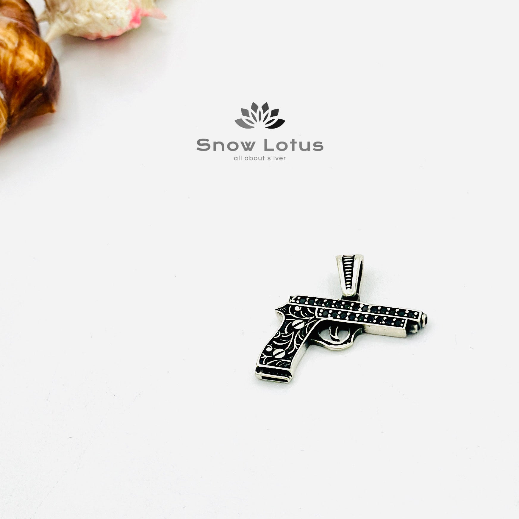 Gun pendant