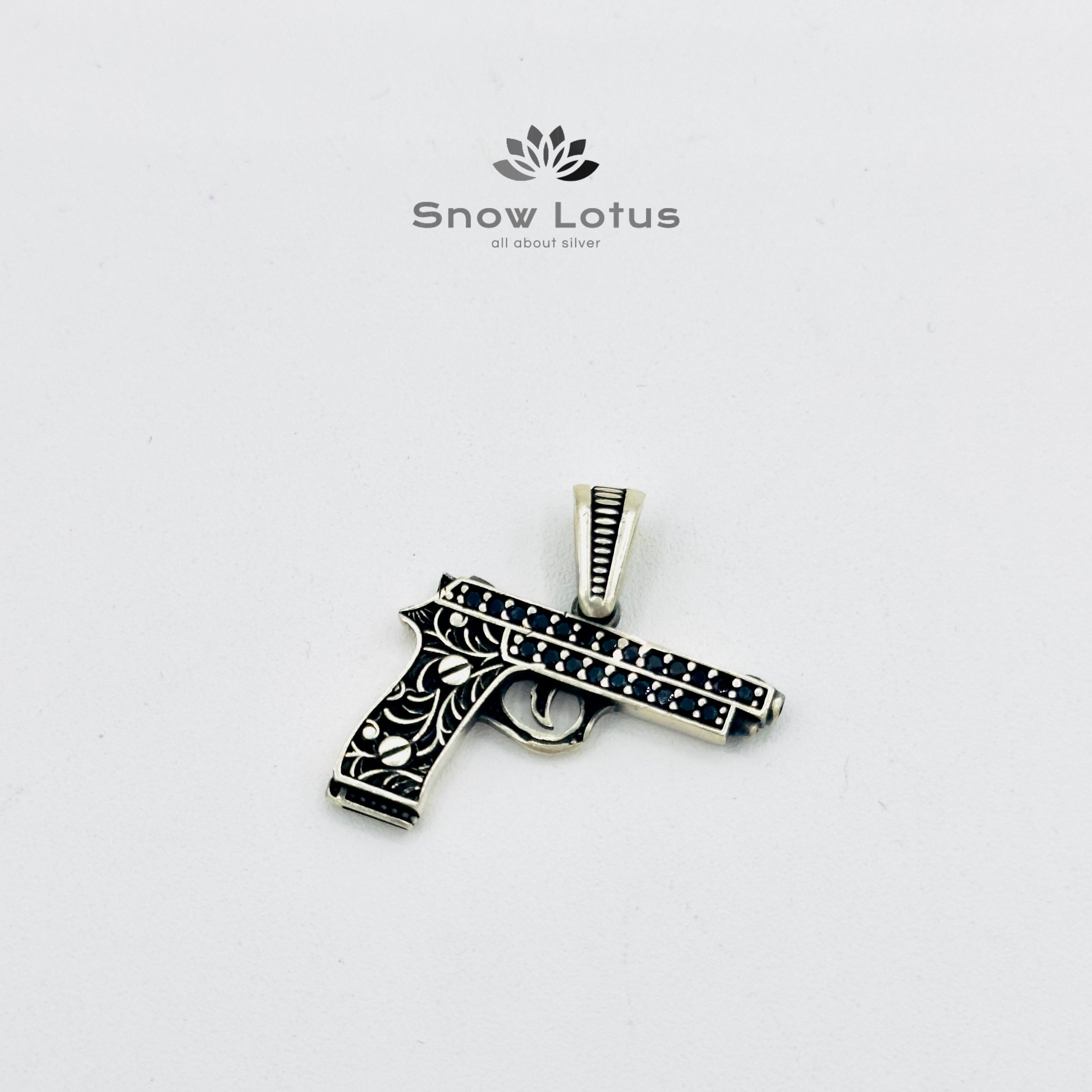 Gun pendant